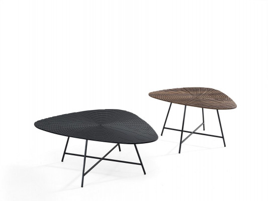 Stylish black coffee table for the living room with a carved tabletop