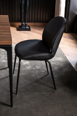 Laconic black chair in modern design for the dining room