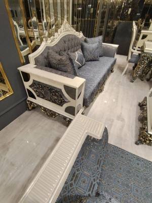 Luxurious living room set with 2x 3-seater sofas, two armchairs, and coffee table.