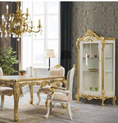 Luxurious dining chair in beige-white tones with golden accents, classically designed