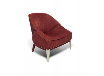Red designer armchair with wooden legs, upholstered single-seater for living room furniture.