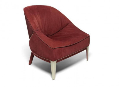 Red designer armchair with wooden legs, upholstered single-seater for living room furniture.
