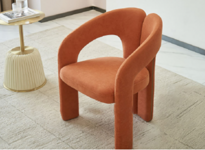 Orange armchair living room chair single-seater upholstered seating lounge relax.