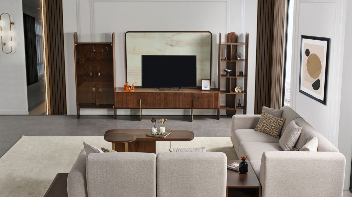 Stylish living room set consists of wall unit, coffee table, and side table.