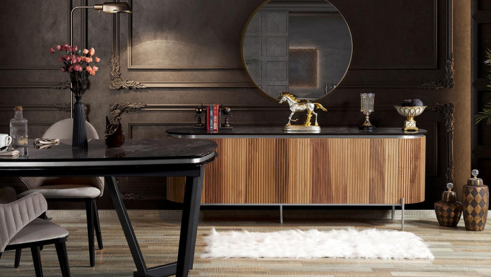 Luxurious dining room set consists of a modern black sideboard and mirror.