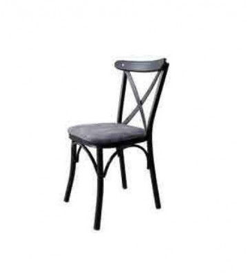 A wooden chair with a soft seat and a round back for your dining room.