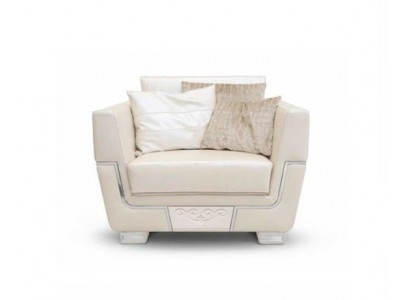 Beige elegance in focus: fabric armchair for a stylish living room ambiance