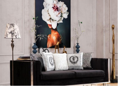 Black designer three-seater living room couch with metal frame