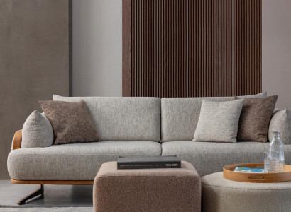 Luxurious 3-seater sofa, light color, modern furniture in living room