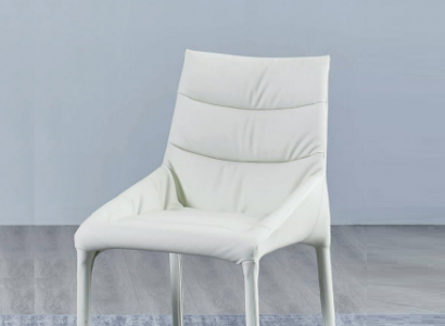 Dining room white single-seater designer chair with wooden frame and armrests.