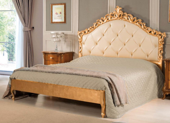 New luxurious Chesterfield double bed with carved headboard