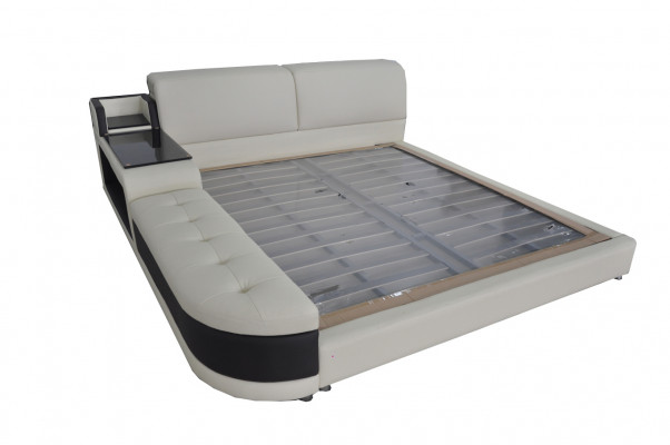 Designer upholstered bed for the bedroom made from high-quality materials