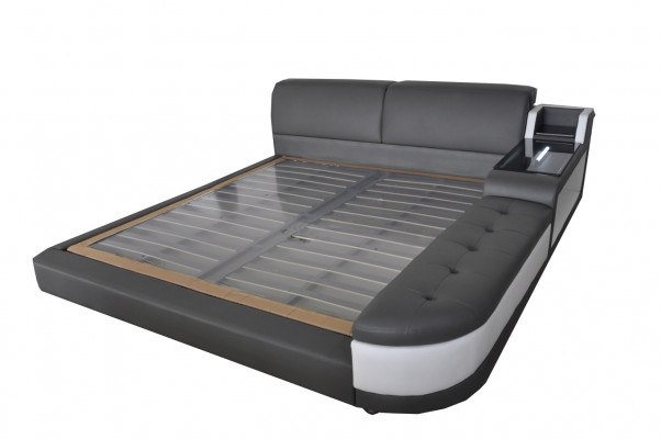 Designer upholstered bed for the bedroom made from high-quality materials