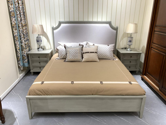 Premium bedroom set: bed and nightstands made of natural wood in gray