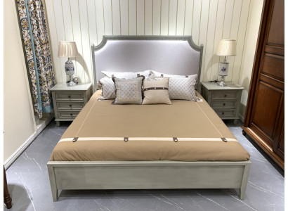 Premium bedroom set: bed and nightstands made of natural wood in gray