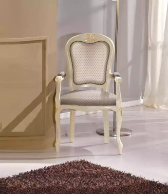 Luxury armchair with white upholstery and armrests for the living room