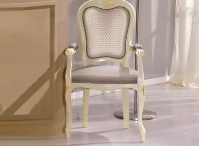 Luxury armchair with white upholstery and armrests for the living room