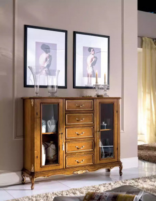 Exclusive brown wooden display cabinet with drawers in classic furniture style.