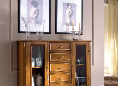 Exclusive brown wooden display cabinet with drawers in classic furniture style.