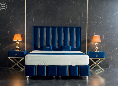 Sapphire blue designer bed with nightstands on gilded steel legs.