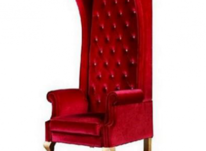 The Voltaire chair is a stunning example of classic English style in a rich shade of red.