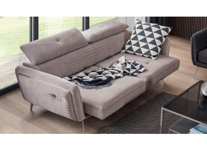 Luxurious, fashionable two-seater sofa with fabric upholstery on high legs