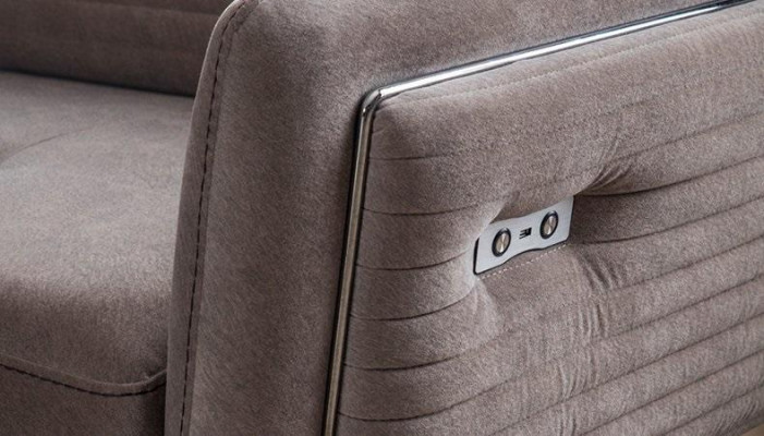 Luxurious, fashionable two-seater sofa with fabric upholstery on high legs