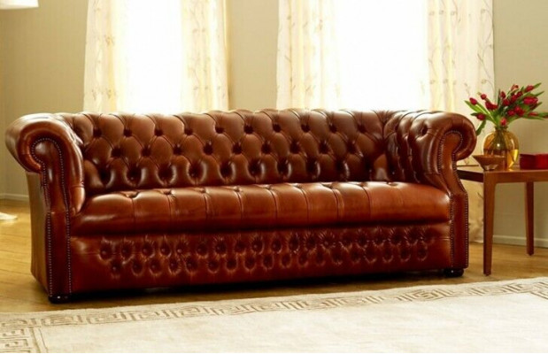 Brown Chesterfield three-seater designer sofa stylish couch