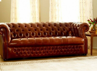 Brown Chesterfield three-seater designer sofa stylish couch