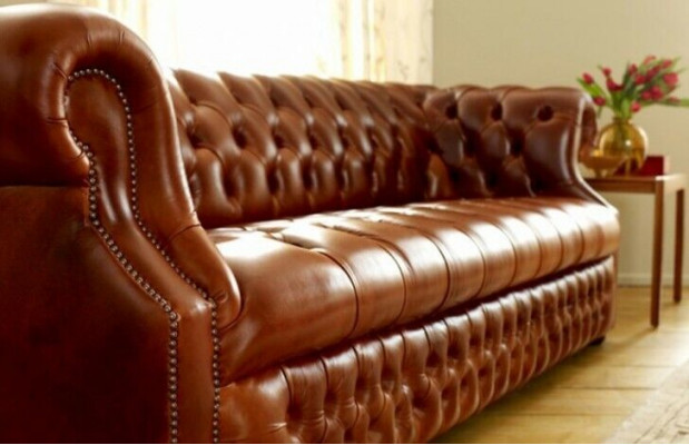 Brown Chesterfield three-seater designer sofa stylish couch