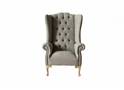 Gray wingback armchair armchair design upholstery Chesterfield fabric living room