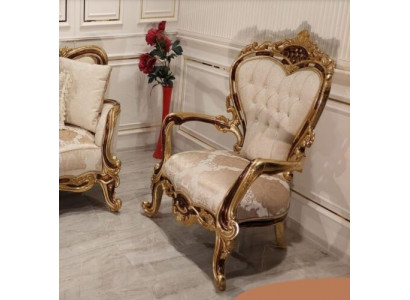 A luxurious classic wingback chair in white Baroque by Chesterfield