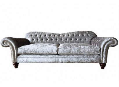 Luxurious classic gray three-seater Chesterfield sofa