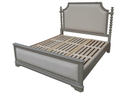 Elegant double bed with classic design and luxurious headboard