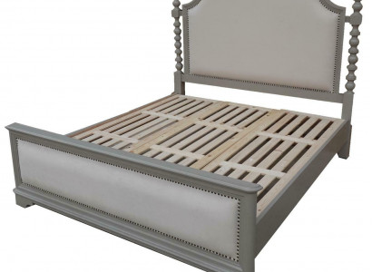 Elegant double bed with classic design and luxurious headboard