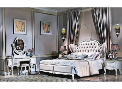 King size double bed with leather headboard in classic Chesterfield-style design