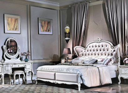King size double bed with leather headboard in classic Chesterfield-style design