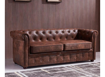 Luxurious Chesterfield sofa made of faux leather for the living room