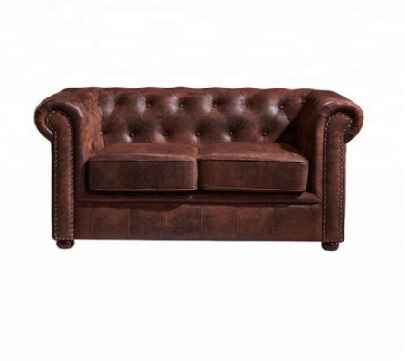 Luxurious Chesterfield sofa made of faux leather for the living room