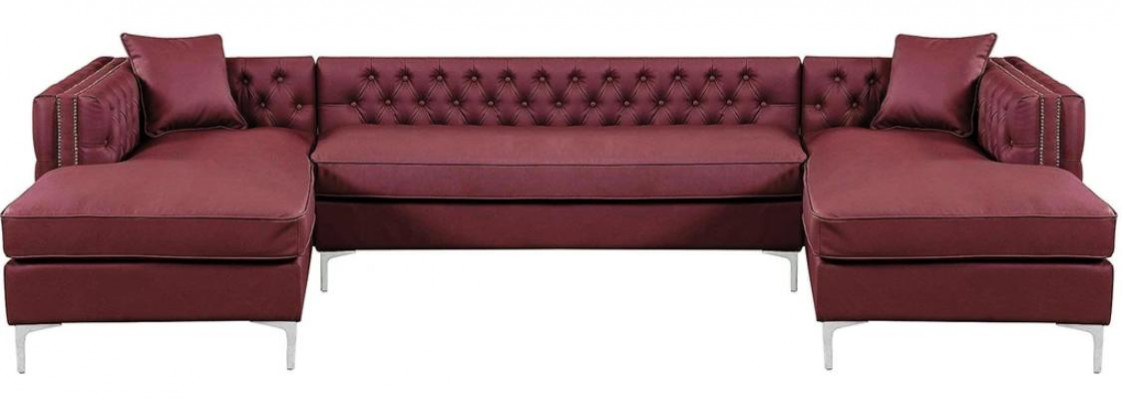 Beige sectional sofa living area couch corner suite upholstery Chesterfield furniture design.