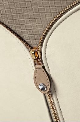 Designer three-seater upholstered sofa with modern design for the living room