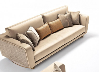 Designer three-seater upholstered sofa with modern design for the living room