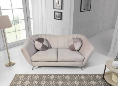 The 2-seater sofa in an elegant and modern style fits perfectly into any interior.