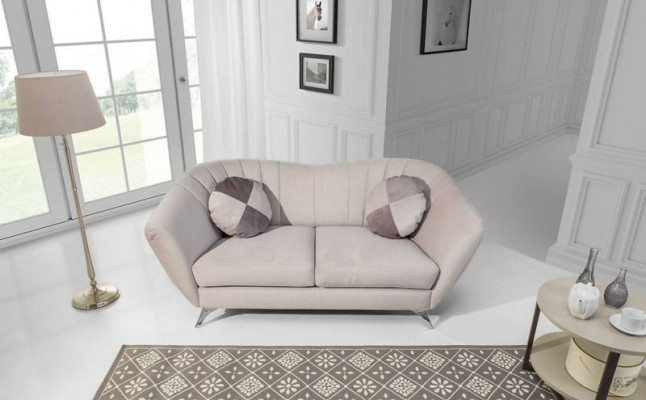 The 2-seater sofa in an elegant and modern style fits perfectly into any interior.