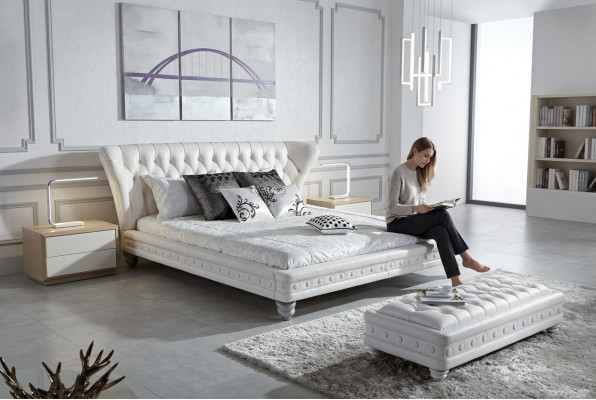 Designer double bed leather Chesterfield hotel luxury bedroom