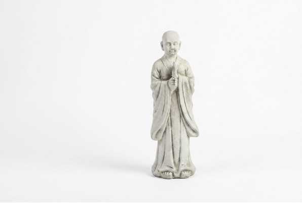 Buddha sculpture in stone look. Large decorative sculpture for garden figure.