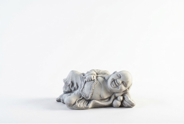 Figure Buddha sculpture in stone look. Large sculpture for garden decorative.