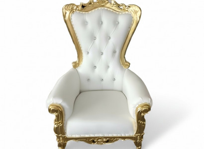 Elegant white armchair with a dynamic silhouette and magnificent decorative elements in the form of floral patterns.