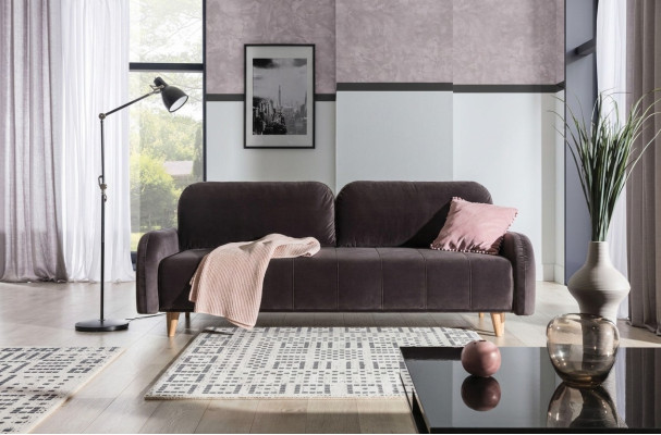 The luxurious large sofa bed is made from high-quality material.