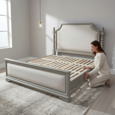 Elegant double bed with classic design and luxurious headboard